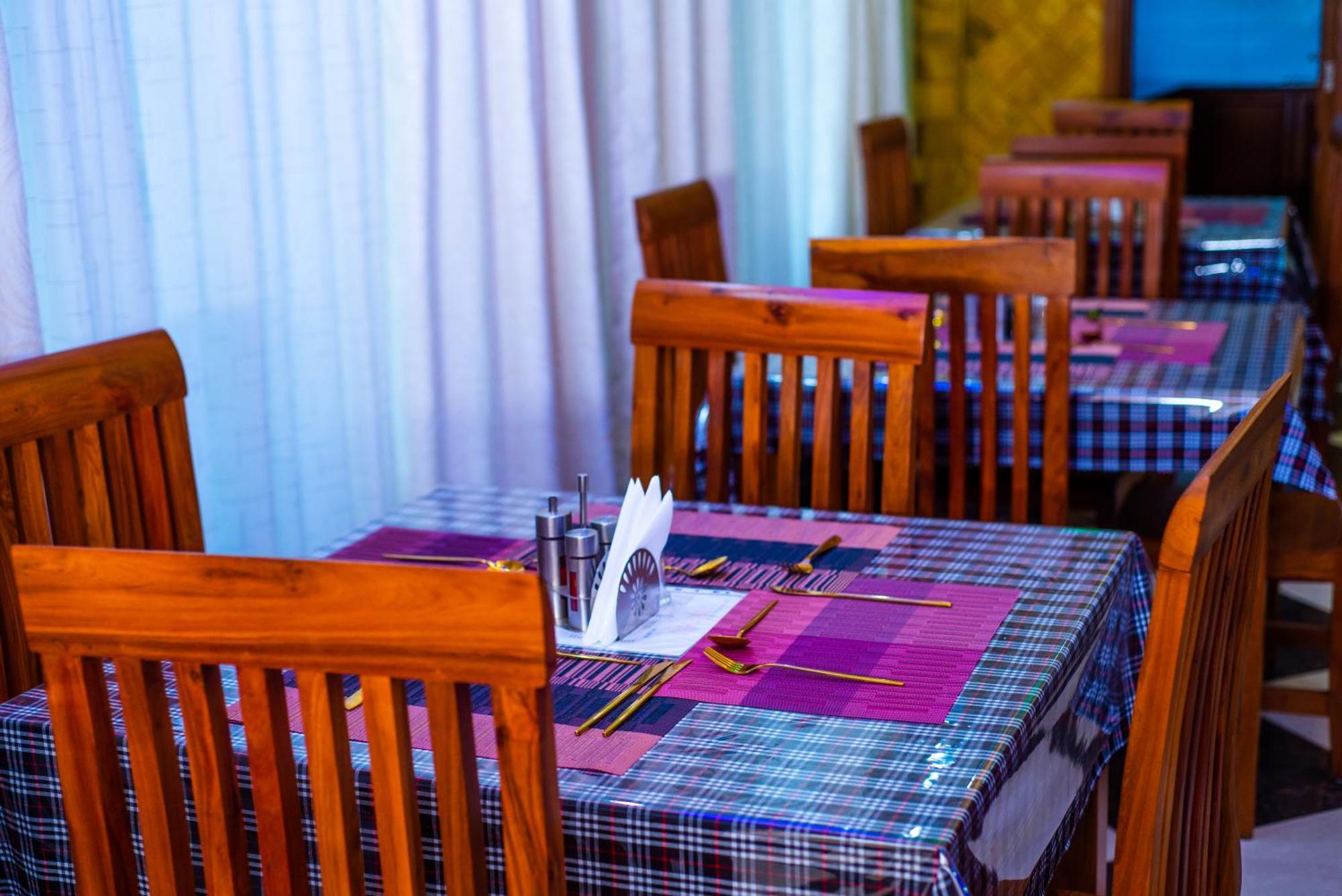 Aves Executive Hotel Arusha Buitenkant foto