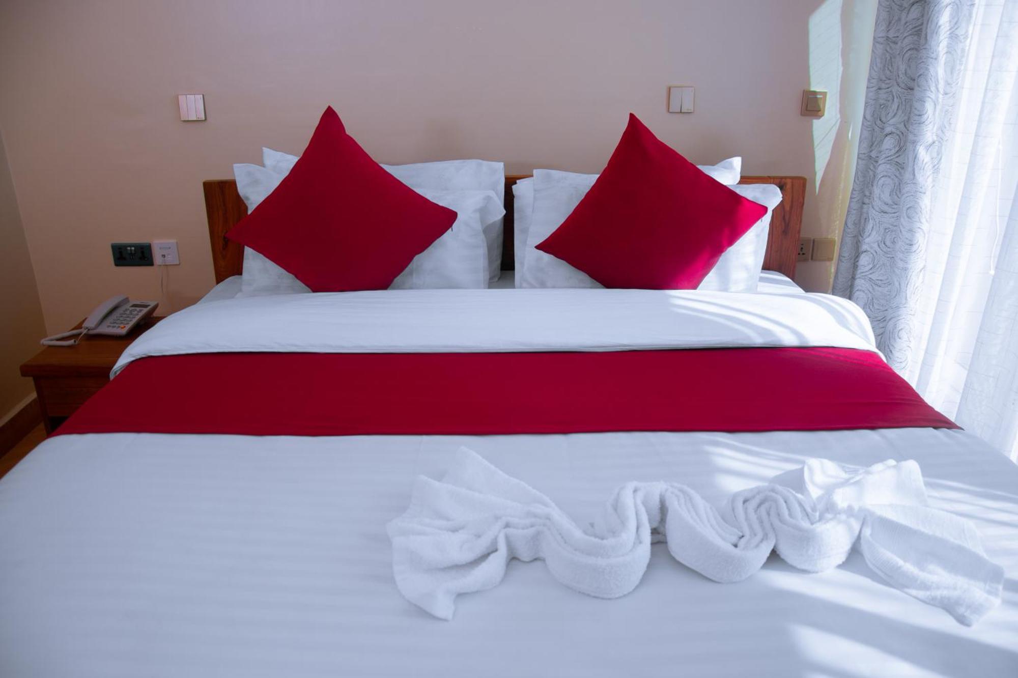 Aves Executive Hotel Arusha Buitenkant foto
