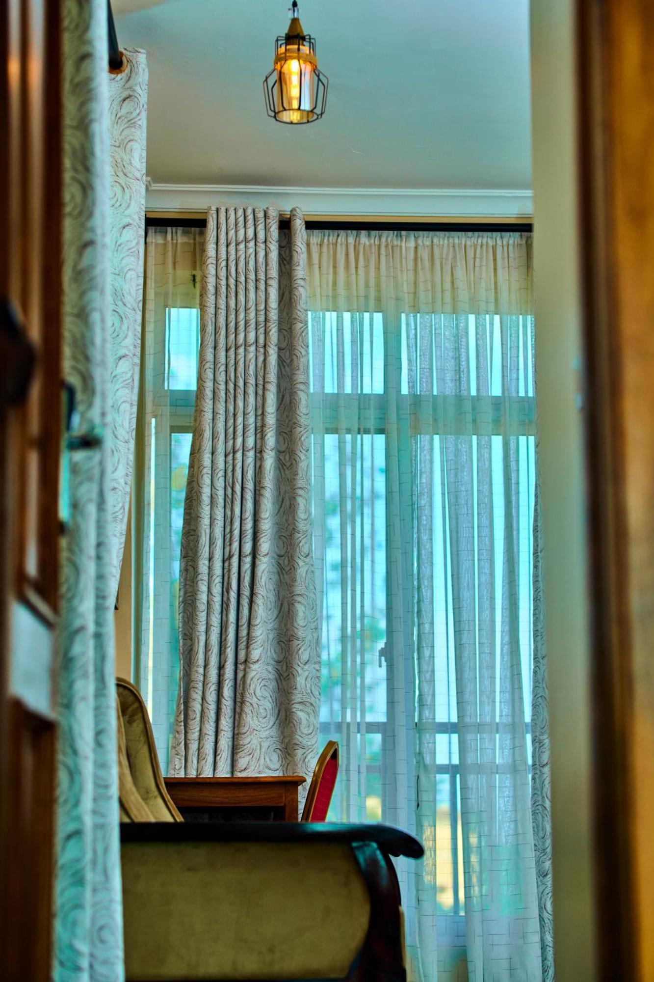 Aves Executive Hotel Arusha Buitenkant foto